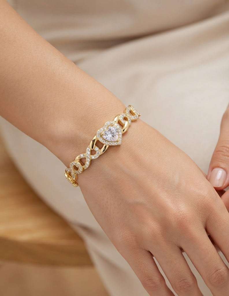 Gold-plated bracelet with heart and infinity charms - front view
